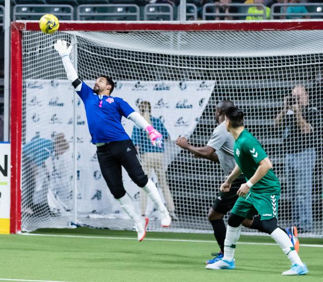 Dallas Sidekicks lunge to make a save against the St. Louis Ambush in preseason play