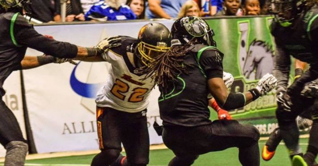 Defensive back Joe Blount (22) with the Triangle Torch