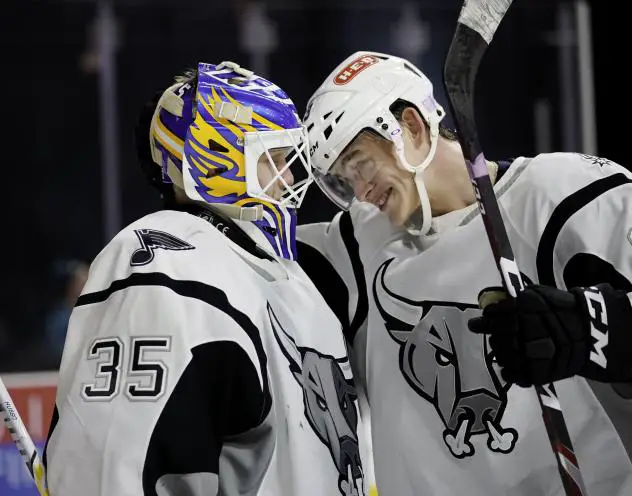 #35 Ville Husso and #13 Alexey Toropchenko of the San Antonio Rampage