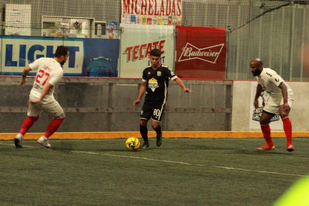 Kansas City Comets defenders close in on the Turlock Cal Express