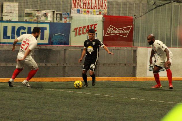 Kansas City Comets defenders close in on the Turlock Cal Express