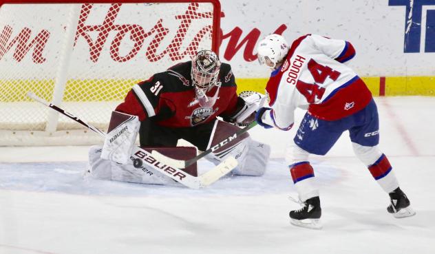 Vancouver Giants goaltender Trent Miner stops a penalty shot