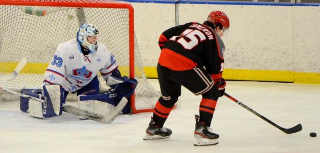 Matt Cameron of the New Jersey Titans eyes the Maine Nordiques goal