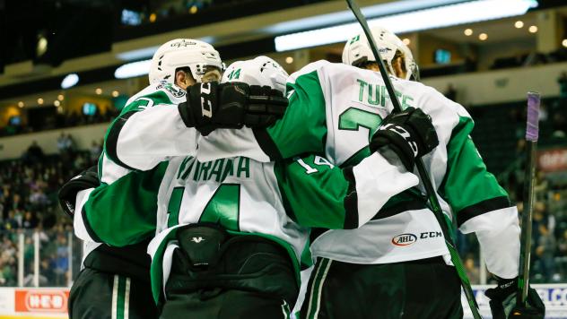 Texas Stars celebrate a goal against the Iowa Wild