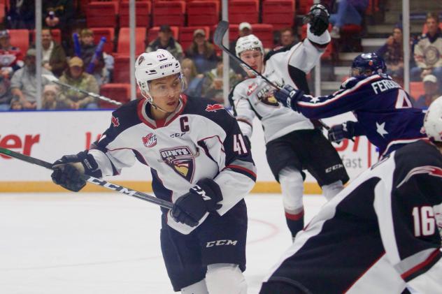 Vancouver Giants defenceman Alex Kannok Leipert (left) vs. the Tri-City Americans