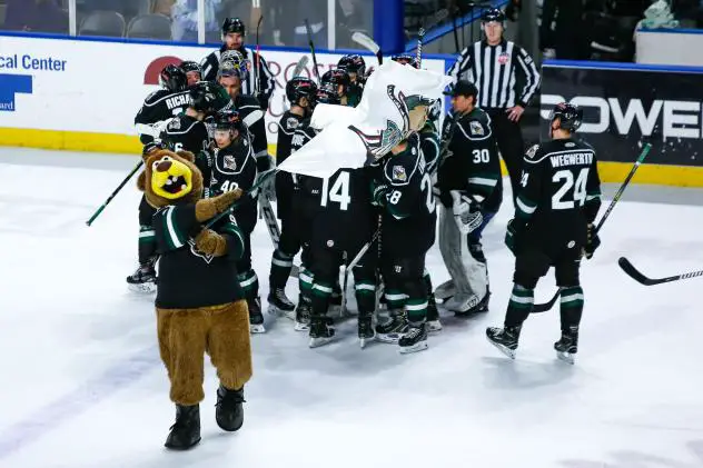 Utah Grizzlies huddle up after a win