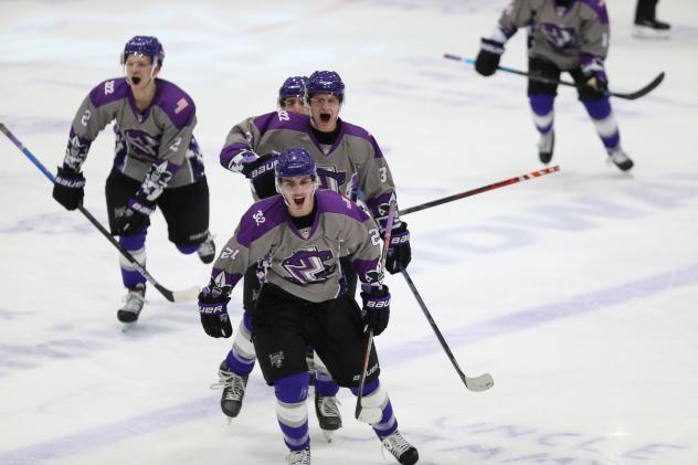 Tri-City Storm react after a goal