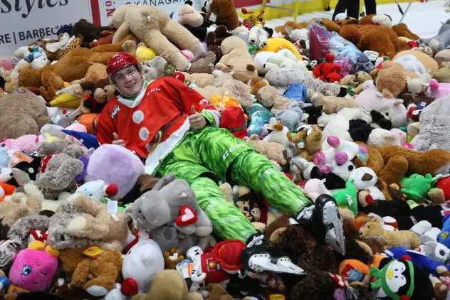 Michal Kvasnica of the Vancouver Giants relaxes in a sea of teddy bears