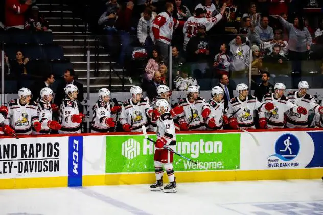 Grand Rapids Griffins left wing Taro Hirose and the Griffins bench