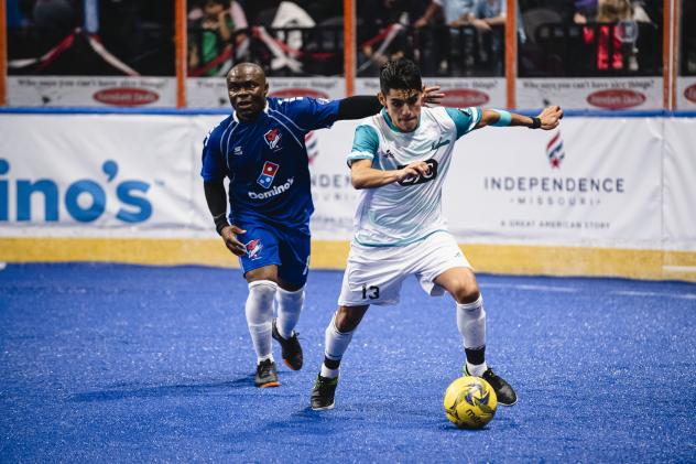 Kansas City Comets forward Leo Gibson (left) vs. the St. Louis Ambush