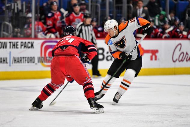Lehigh Valley Phantoms right wing Nicolas Aube-Kubel (right) vs. the Hartford Wolf Pack