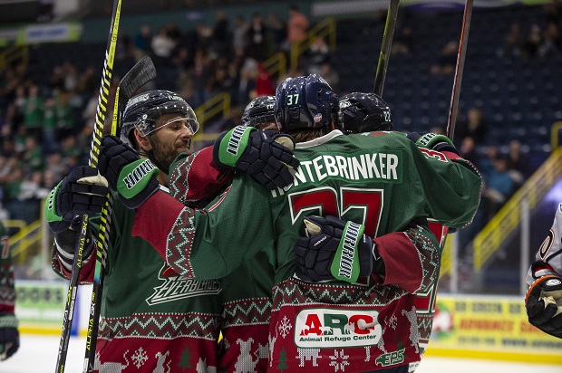 Florida Everblades in their ugly Christmas sweater jerseys