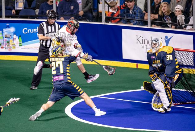 Georgia Swarm defender Adam Wiedemann and goaltender Mike Poulin vs. the Philadelphia Wings