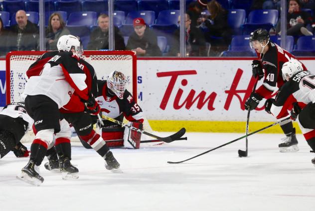 Vancouver Giants centre Milos Roman (right) prepares to shoot vs. the Prince George Cougars