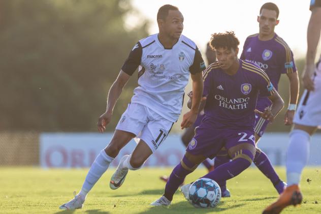 Winger Jamael Cox (left) with FC Tucson