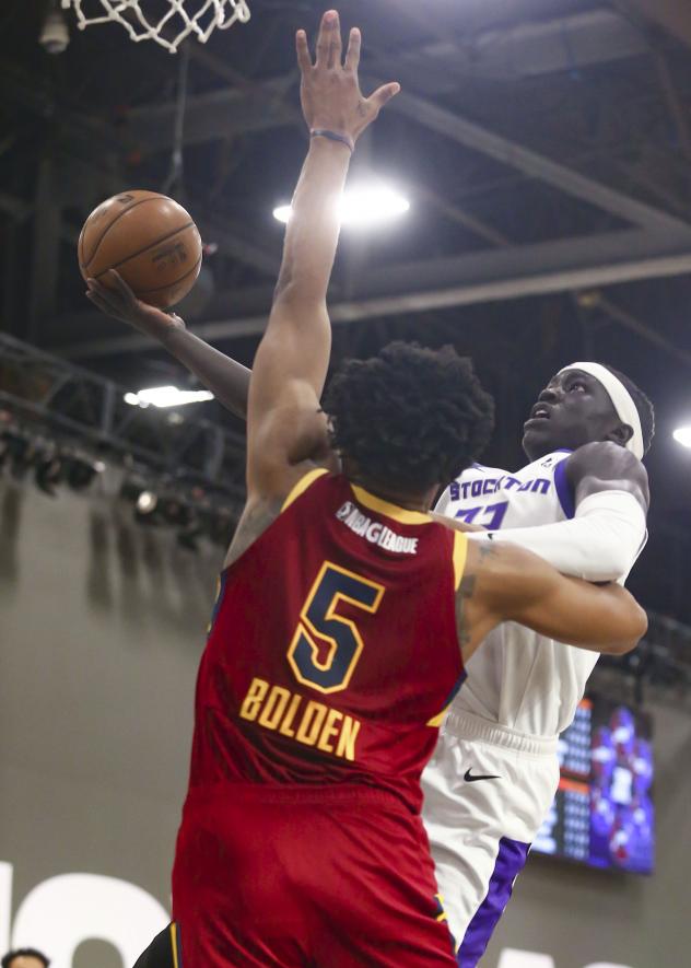 Canton Charge center Marques Bolden defends against the Stockton Kings