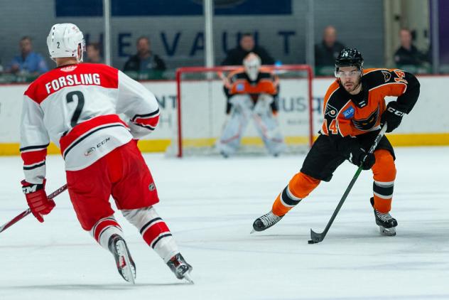 Lehigh Valley Phantoms defenseman Mark Friedman (right) vs. the Charlotte Checkers