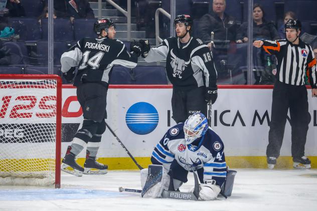 #18 Nolan Stevens and #14 Austin Poganski of the San Antonio Rampage celebrate Stevens' first shorthanded goal