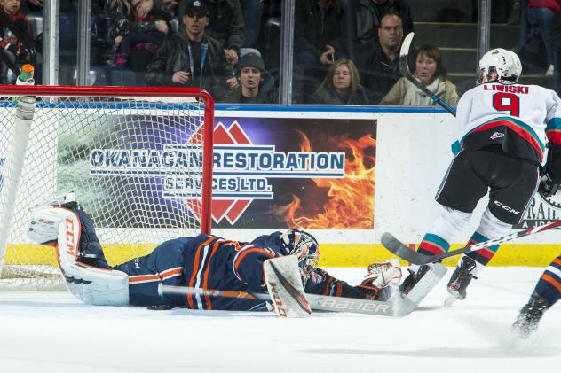 Mark Liwiski of the Kelowna Rockets shoots against the Kamloops Blazers
