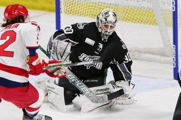 Josh Brittain of the Allen Americans takes a shot against the Idaho Steelheads
