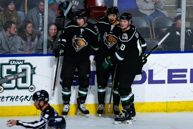 Utah Grizzlies Forwards Tim McGauley and Griffen Molino with Ty Lewis (right)