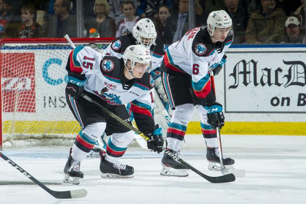 Kelowna Rockets right wing Dallon Wilton and defenceman Kaedan Korczak