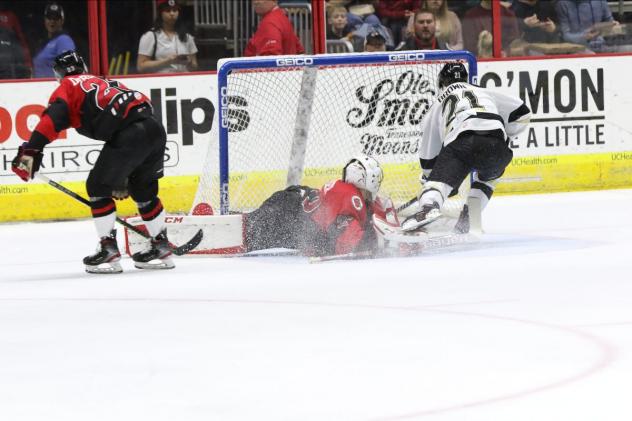Cam Brown of the Wheeling Nailers (21) scores against the Cincinnati Cyclones