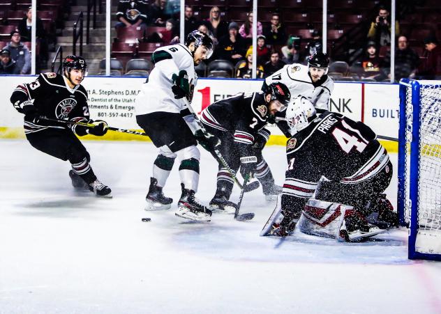 Peter Tischke (center) and Griffen Molino of the Utah Grizzlies test the Rapid City Rush defense