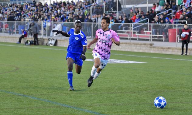 Forward Madison FC forward Jiro Barriga Toyama (right)