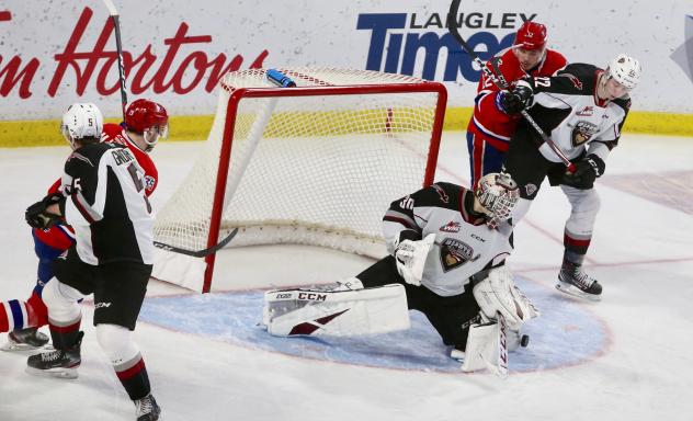 Vancouver Giants goaltender David Tendeck eyes the puck vs. the Spokane Chiefs