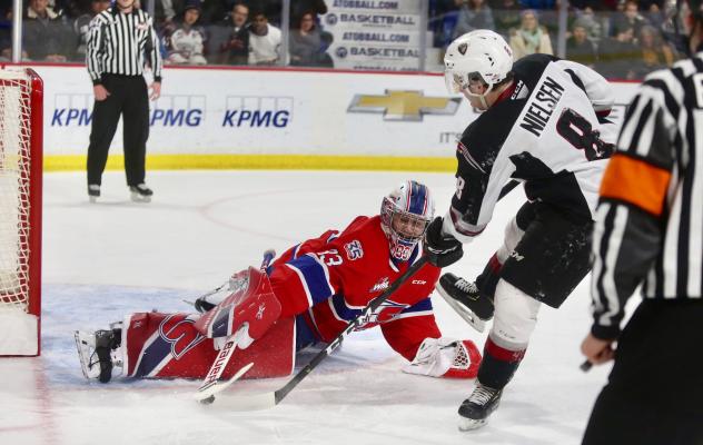 Vancouver Giants centre Tristen Nielsen shoots vs. the Spokane Chiefs