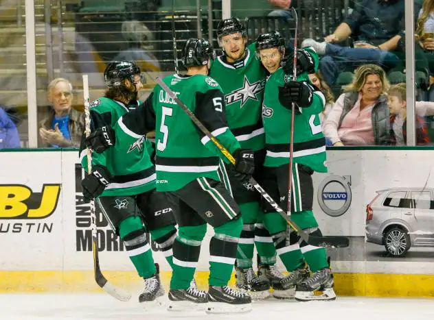 Texas Stars offer congratulations after a goal against the Wilkes-Barre/Scranton Penguins