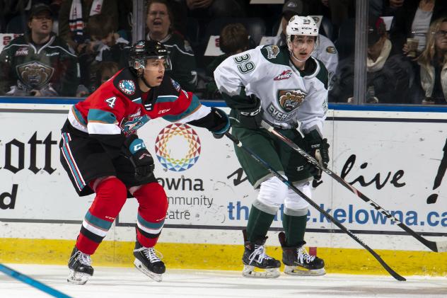 Kelowna Rockets defenceman Devin Steffler (left) vs. the Everett Silvertips