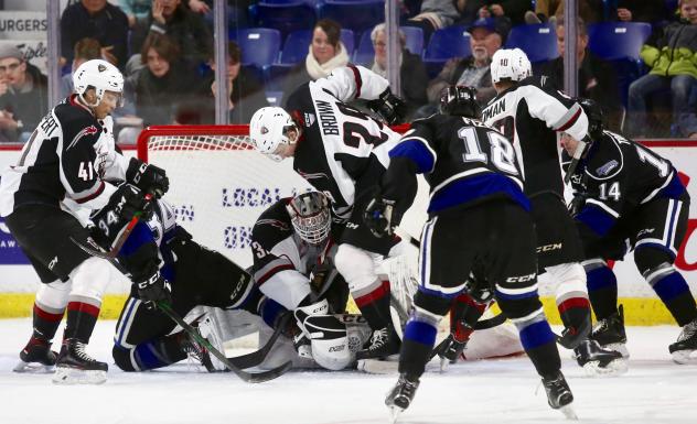 Vancouver Giants defenceman Tanner Brown battles near the Victoria Royals net