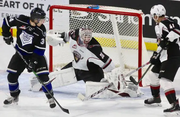 Vancouver Giants goaltender David Tendeck makes a stop against the Victoria Royals