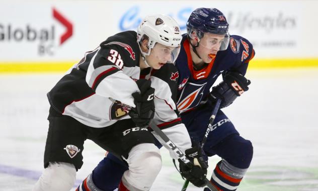 Vancouver Giants left wing Michal Kvasnica (left) vs. the Kamloops Blazers