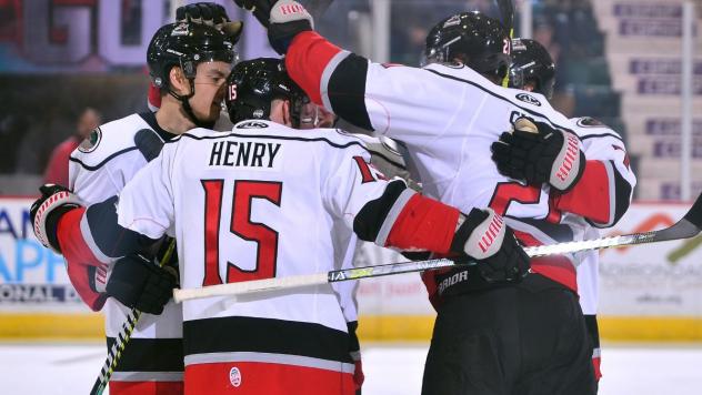 Adirondack Thunder exchange congratulations after a goal