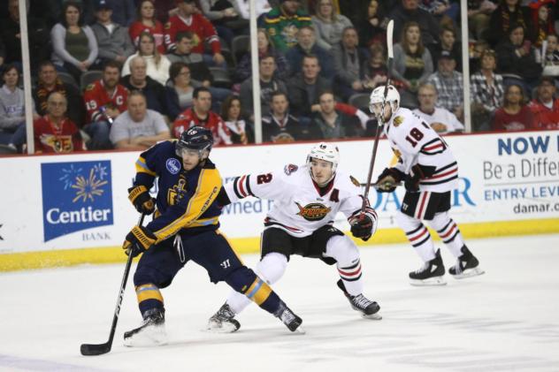 Atlanta Gladiators forward Samuel Asselin (left) vs. the Indy Fuel