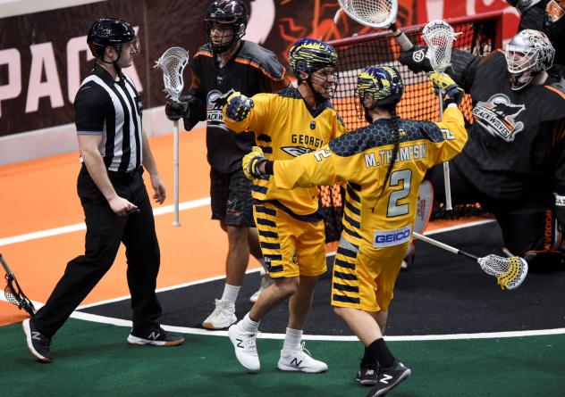 Miles and Lyle Thompson of the Georgia Swarm celebrate against the New England Black Wolves