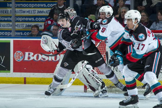Kelowna Rockets defend against the Vancouver Giants