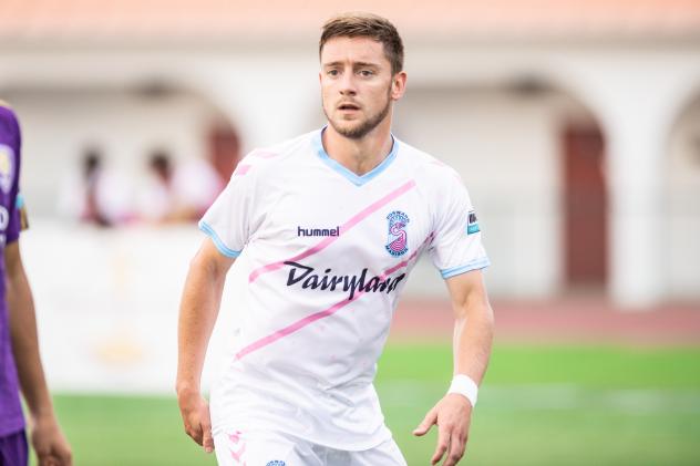 Forward Madison FC fullback Carl Schneider
