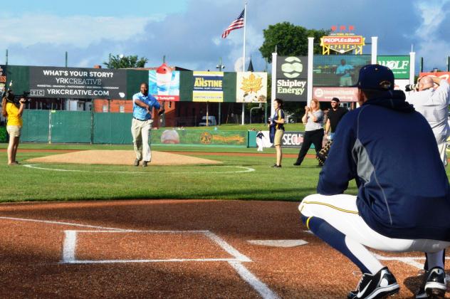Chris Doleman delivers the first pitch at a York Revolution game