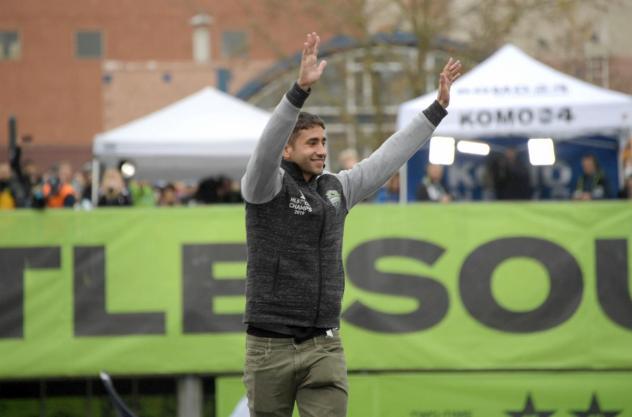 Emanuel Cecchini celebrates at the MLS Cup Champions Parade and Rally in November