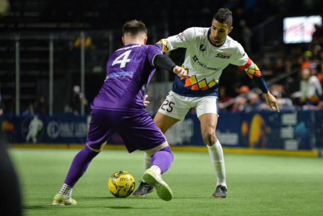 Danny DiPrima of the Harrisburg Heat defends against the Tacoma Stars