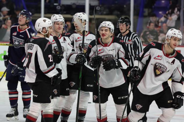 Vancouver Giants huddle up after a goal against the Tri-City Americans