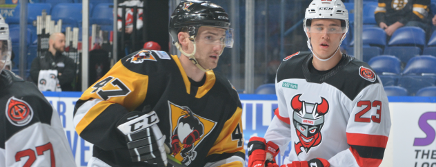 Binghamton Devils left wing Mikhail Maltsev (right) vs. the Wilkes-Barre/Scranton Penguins
