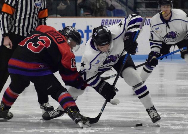 Odessa Jackalopes forward Mike Manzo (left) faces off with the Lone Star Brahmas