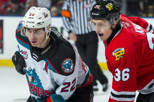 Kelowna Rockets left wing Dillon Hamaliuk (left) vs. the Portland Winterhawks