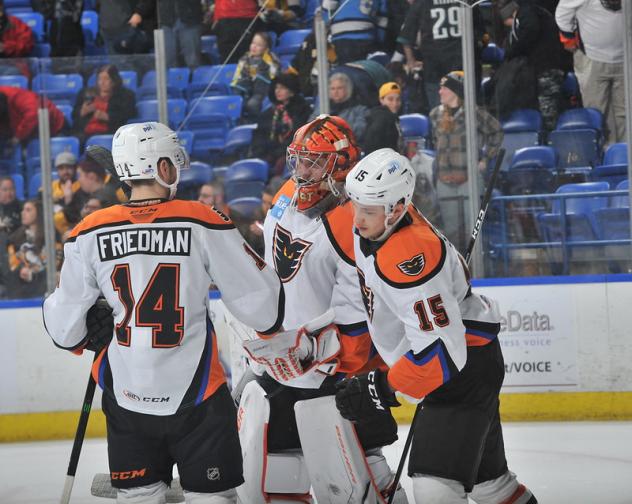 Lehigh Valley Phantoms goaltender Kirill Ustimenko with teammates