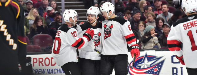 Binghamton Devils celebrate a goal against the Cleveland Monsters